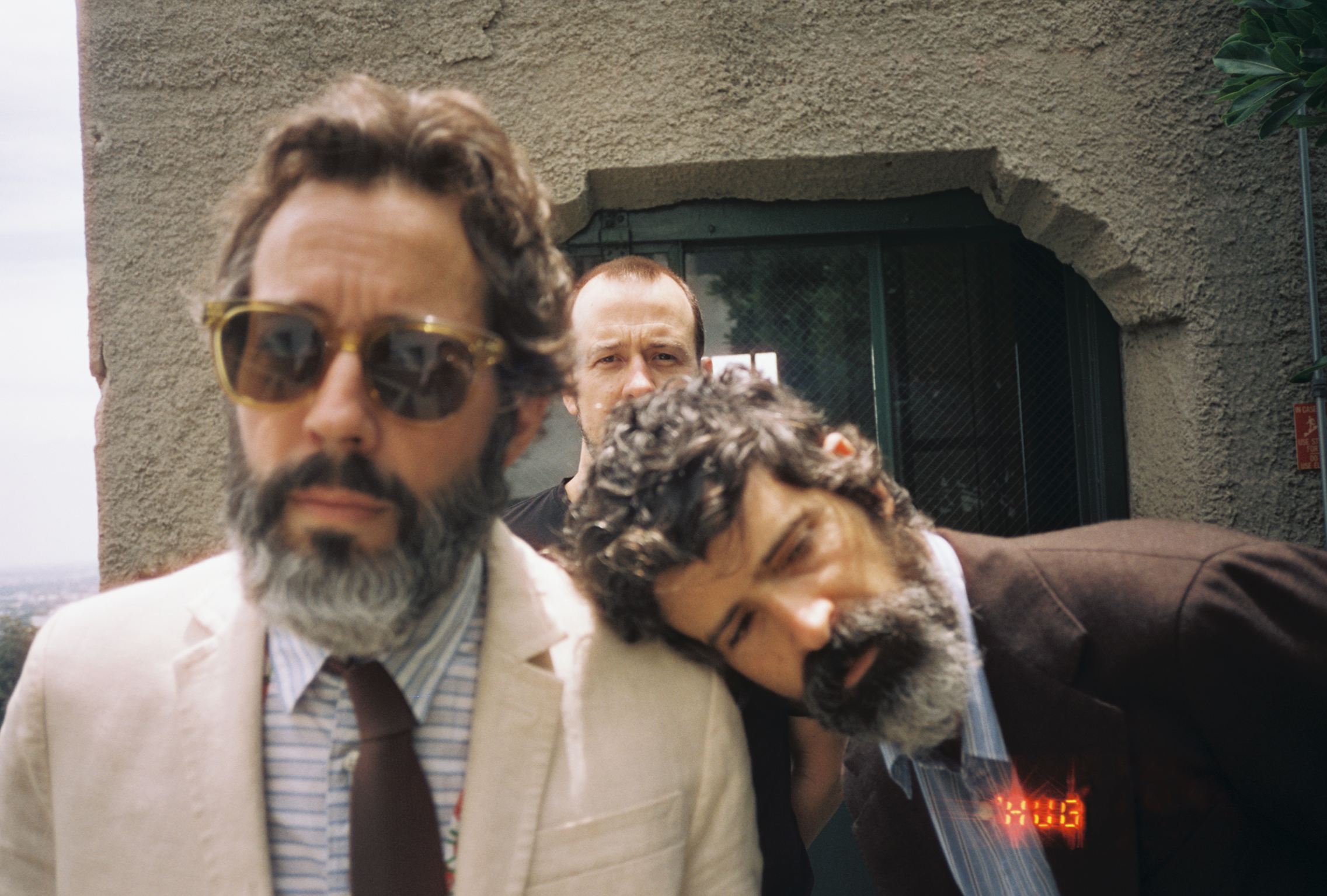Photograph of Gyan Riley, Devendra Banhart, and Noah Georgeson.